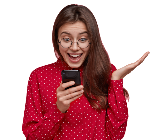 cheerful-pleased-woman-browses-network-cell-phone-gestures-actively-makes-shopping-online-wears-red-shirt